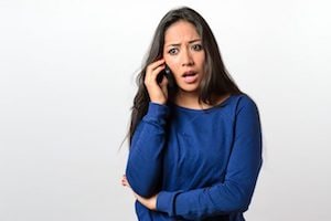 woman receiving harassing call